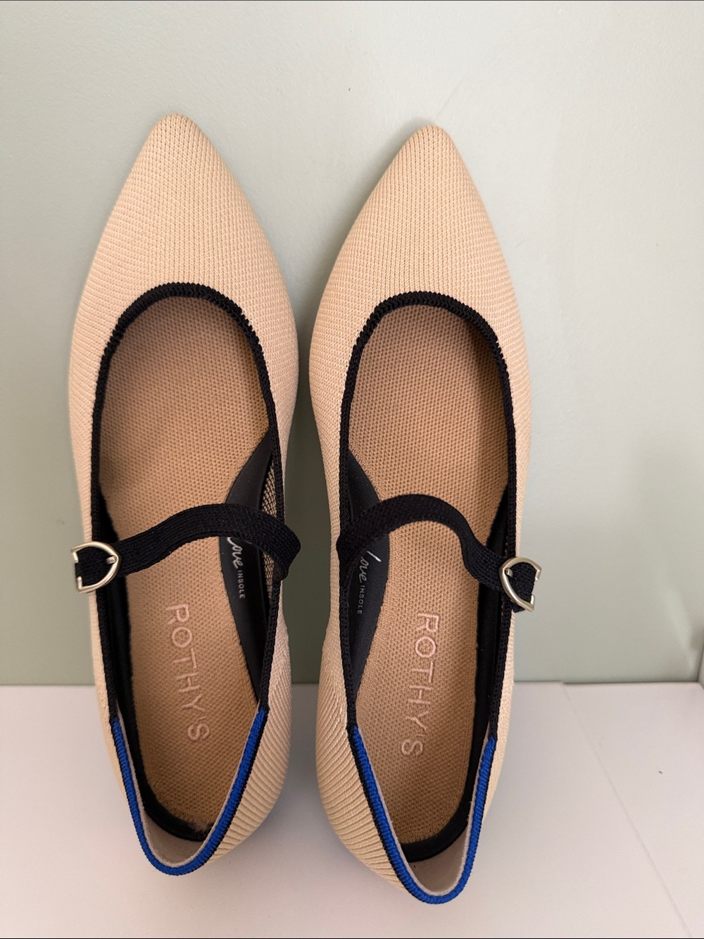 Rothy's Pointed Mary Jane Flats in Beige with Black Trim and Blue Accent